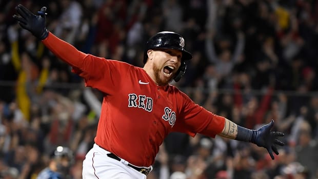 Red Sox catcher Christian Vazquez reacts after hitting a walk-off two run home run against the Tampa Bay Rays during the thirteenth inning in game three of the 2021 ALDS at Fenway Park.